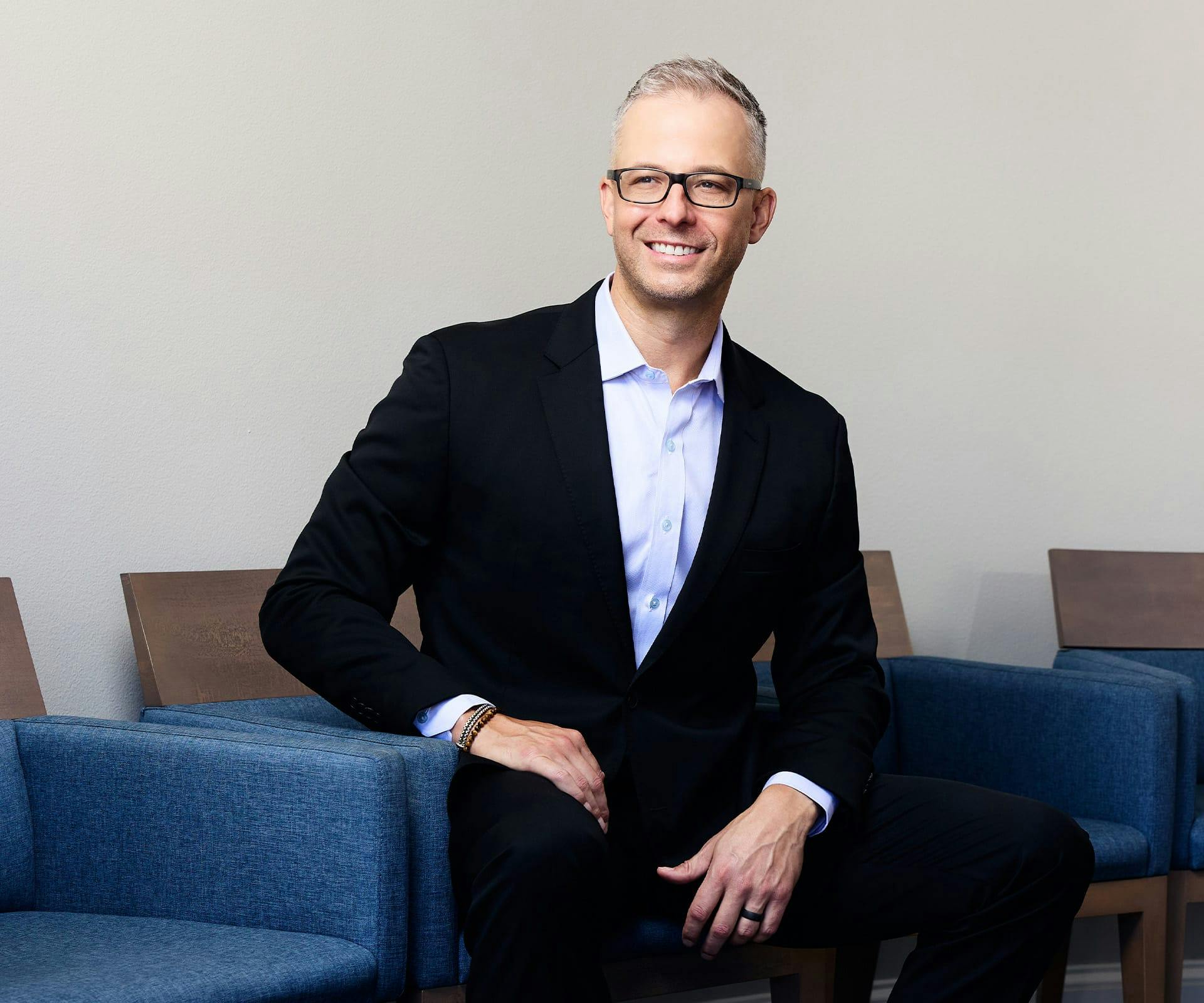 Dr. Guy sitting down